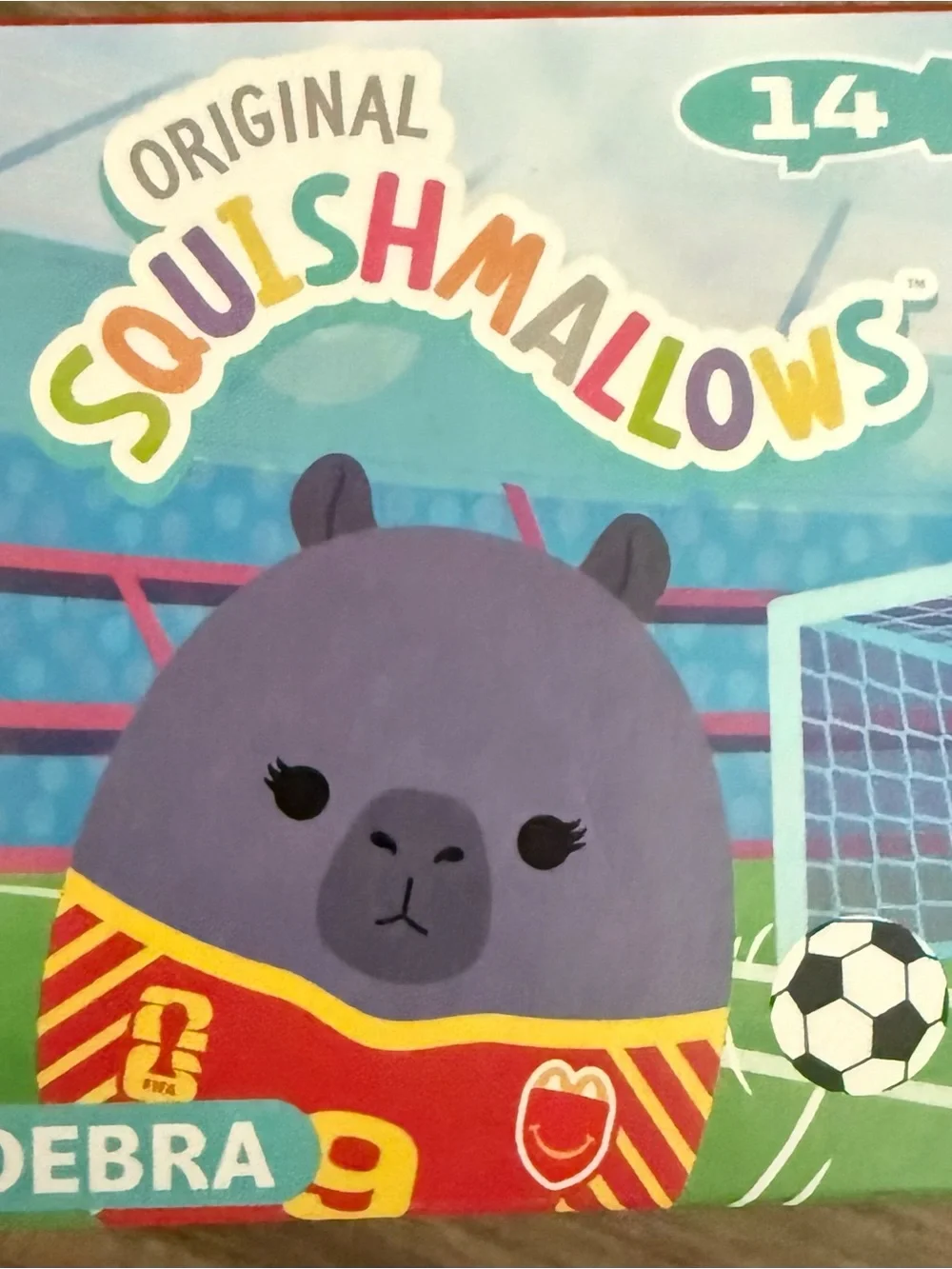 Squishmallows Debra Plush - Purple with Red and Yellow Jersey